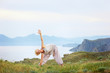 © luengo_ua - Senior woman doing yoga exercises