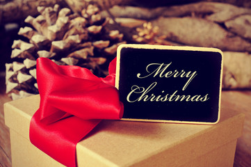 Sticker - gift and signboard with the text merry christmas