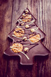 Chocolate christmas tree on wooden background