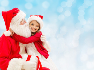 Sticker - smiling little girl with santa claus