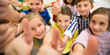 © Syda Productions - group of school kids showing thumbs up