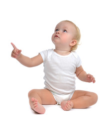 Infant child baby toddler sitting raise hand up pointing finger