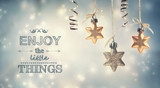 Fototapeta  - Enjoy the Little Things text with star ornaments