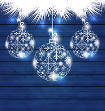 Christmas Balls Made In Snowflakes On Blue Wooden Background