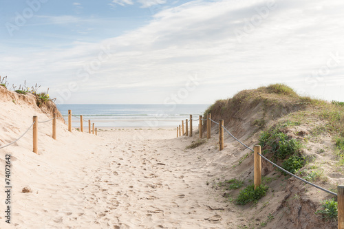 Fototapeta  Arena, cielo y agua