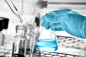 Wall Mural - flask in scientist hand
