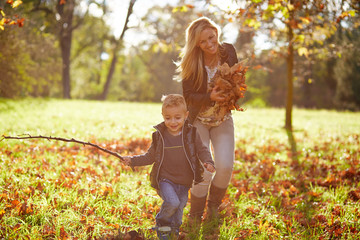 Little boy and mother playing together