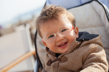 Smiling Baby With Eyeglasses