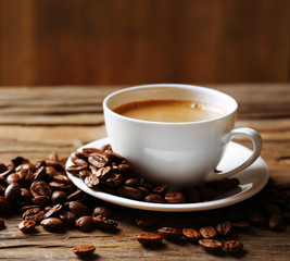 Cup of coffee on wooden table