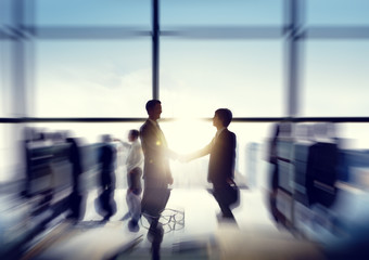 Wall Mural - Group of business people and men handshake reflected onto table