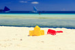 © nadezhda1906 - kids toys on sand beach