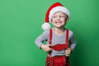 Beautiful little boy dressed like Christmas elf with big smile