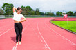 © afe207 - female athlete warm up in stadium arena and race running track t