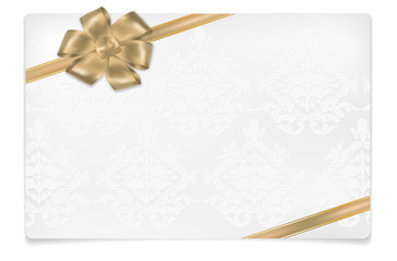 paper card with golden bow and floral ornaments