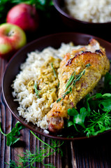 Wall Mural - Baked chicken leg with rice garnish