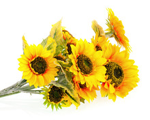 Composition Of Bright Artificial Sunflowers On White Background.