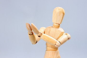 Wooden mannequin applauds