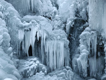 A Frozen Waterfall With Ice In Winter