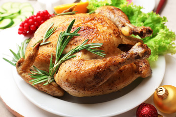 Canvas Print - Baked chicken for festive dinner. Christmas table setting