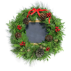 Wall Mural - christmas wreath and a blank chalkboard