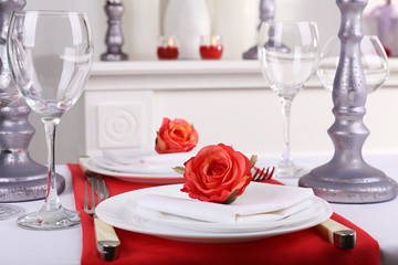 Festive table setting on room background