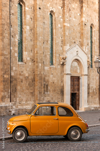 Obraz w ramie Old Italian Car in Front of a Catholic Church