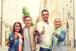 © Syda Productions - group of smiling friends showing thumbs up