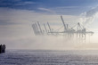 Container Cranes in the Fog