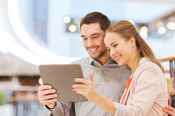 Sticker - happy couple with tablet pc taking selfie in mall