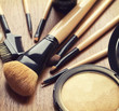 Set of makeup brushes and bronzer highlighter powder