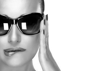 Wall Mural - Beautiful Model in Black Fashion Sunglasses. Beauty and Makeup