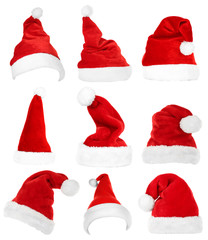 Wall Mural - Collage of Santa hats isolated on white