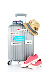 Travel suitcase and tourist stuff with inscription  travel