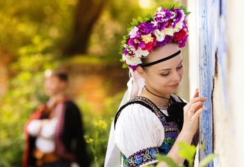 Wall Mural - Couple in love with traditional folk costumes