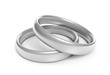 Two silver engagement or wedding rings for a couples wedding