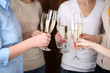 © Africa Studio - Woman hands with glasses of champagne