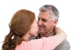 © WavebreakmediaMicro - Casual couple hugging and smiling