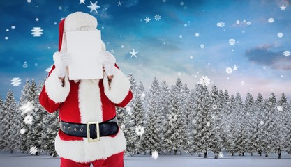 Poster - Composite image of santa claus presenting card