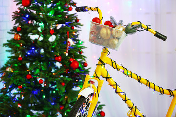 Wall Mural - Yellow bicycle near Christmas tree