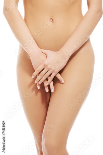 Fényképezés  Nude woman covering her intimate places