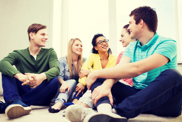 Sticker - five smiling teenagers having fun at home