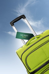 Las Vegas, Nevada. Green suitcase with label