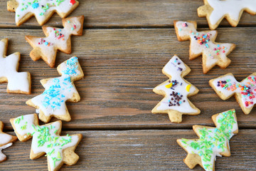 cookies in the shape of Christmas trees on a boards