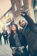 Wall Mural - Tourists Couple Sightseeing The City