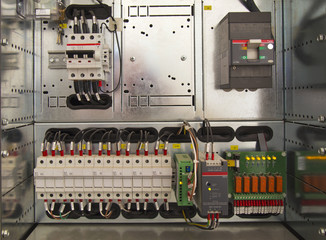 Wall Mural - Electrical cubicle with components and wires closeup