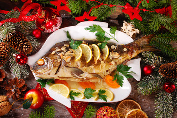 roasted carp stuffed with vegetables for christmas