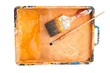 Various palette and a brush on a white background