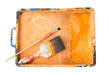 Various palette and a brush on a white background