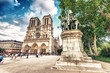 PARIS - MAY 21, 2014: Tourists at Notre Dame Cathedral. More tha