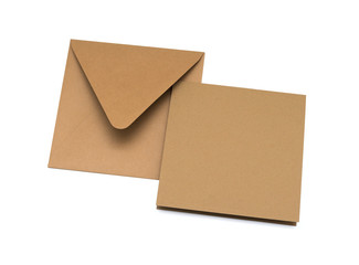 brown envelope with a blank card over white